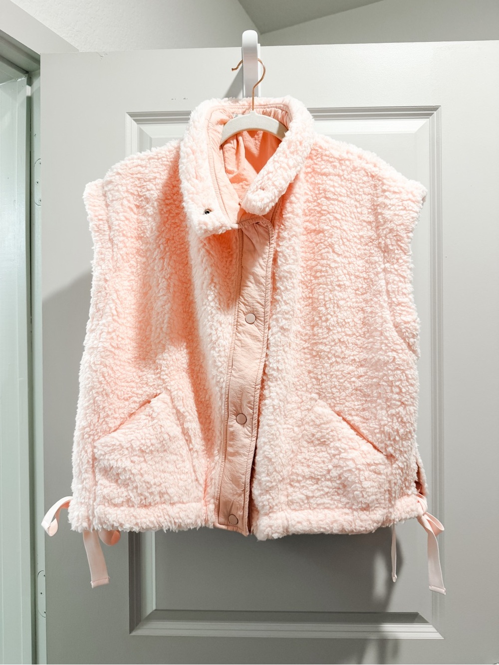 Pink sherpa vest